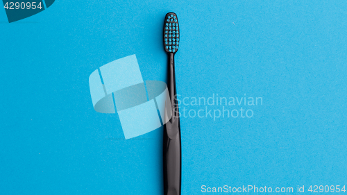 Image of Black toothbrush, place for inscription