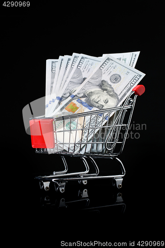 Image of Photo of trolley with dollars