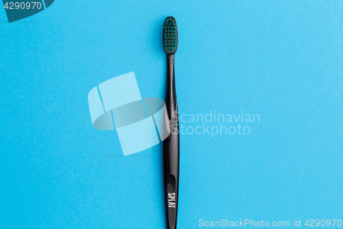 Image of Photo of one black toothbrush