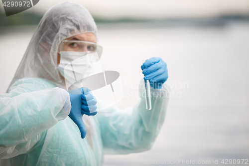 Image of Photo of biologist in mask