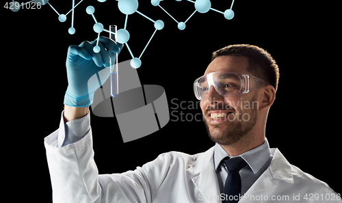 Image of smiling scientist with test tube and molecules