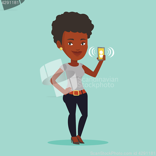 Image of Woman holding ringing mobile phone.