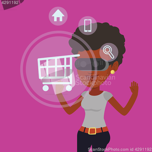 Image of Woman in virtual reality headset shopping online.