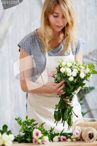 Image of Portrait of blonde with bouquet