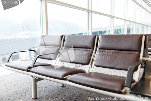 Image of Empty chair at airport