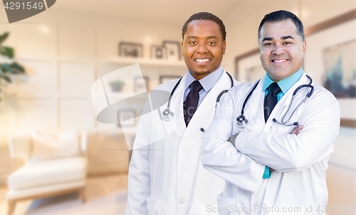 Image of African American and Hispanic Doctors or Nurses Standing in Offi