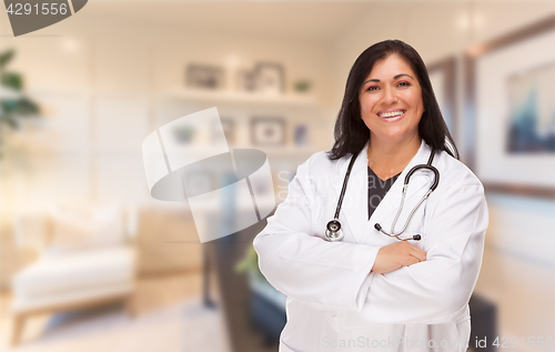 Image of Female Hispanic Doctor or Nurse Standing in Her Office