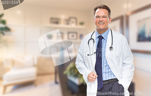 Image of Handsome Doctor or Nurse Standing In His Office