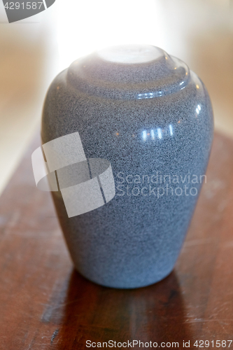 Image of cremation urn on table