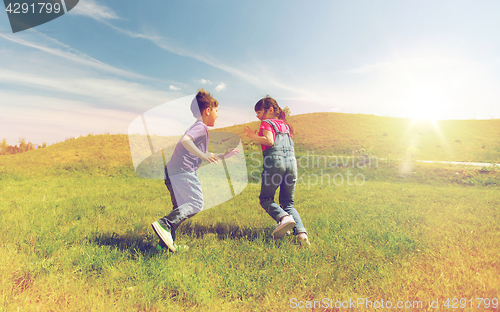 Image of group of happy kids running outdoors
