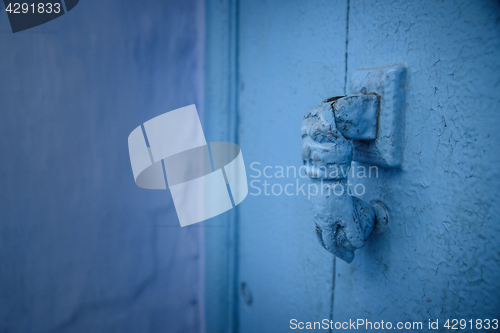 Image of Knocker in Chefchaouen, the blue city in the Morocco.