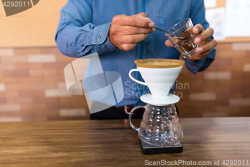 Image of Barista making a coffee