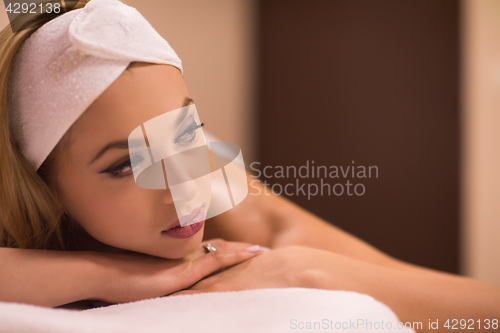 Image of woman laying on massage table