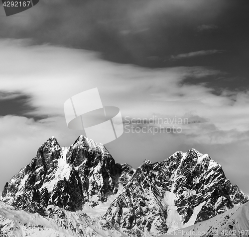 Image of Black and white view on Mounts Ushba and Chatyn and sky with clo
