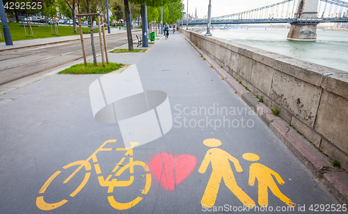 Image of Bicycle signs painted on asphalt