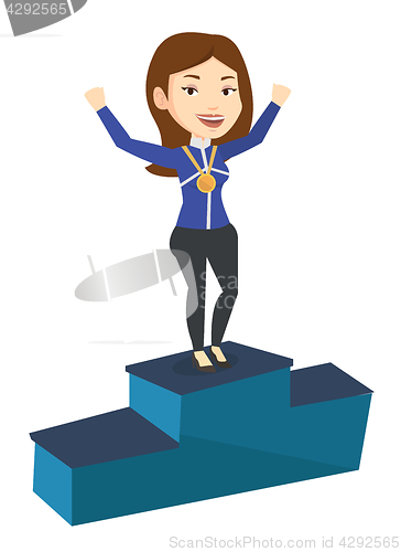 Image of Sportswoman celebrating on the winners podium.