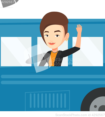 Image of Woman waving hand from bus window.