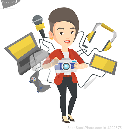 Image of Young woman surrounded with her gadgets.