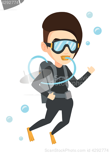 Image of Woman diving with scuba and showing ok sign.