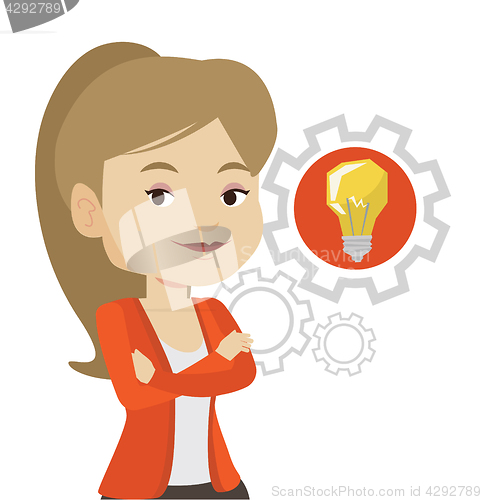 Image of Woman with business idea bulb in gear.