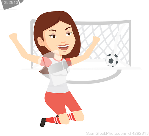 Image of Soccer player celebrating scoring goal.