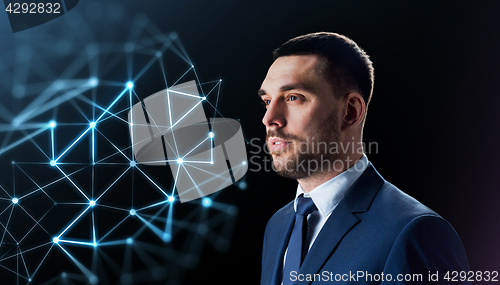 Image of businessman with low poly projection