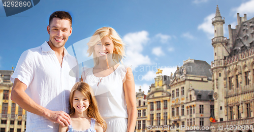 Image of happy family over grand place in brussels city