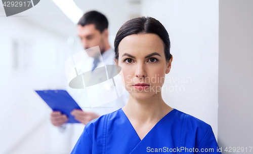 Image of doctor or nurse at hospital corridor