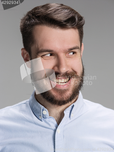 Image of The young man looking away