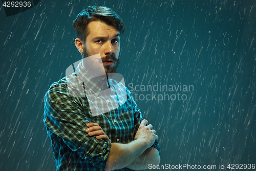 Image of The young man looking at camera