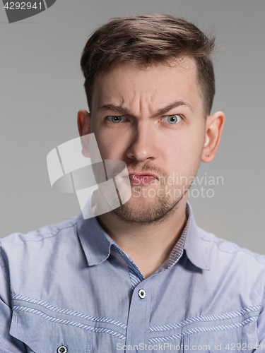 Image of Close up face of angry man