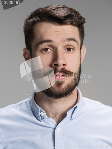 Image of The young man looking at camera