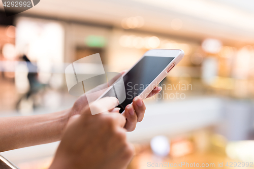 Image of Woman touch on cellphone