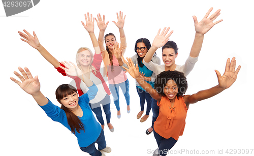 Image of international group of happy smiling women