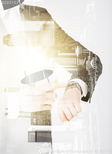 Image of close up of businessman with wristwatch and coffee