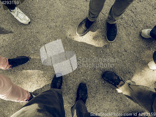 Image of Vintage looking Three people feet