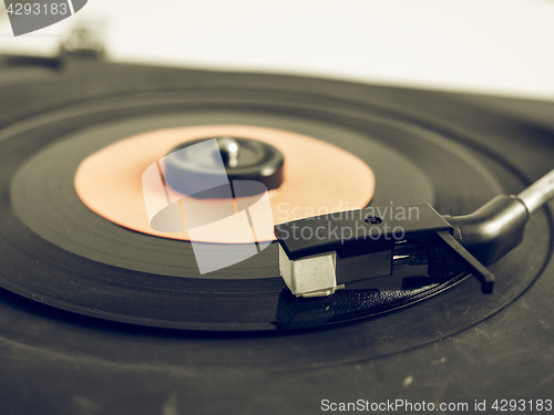 Image of Vintage looking Vinyl record on turntable