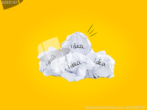 Image of Inspiration concept crumpled paper light bulb metaphor for good idea