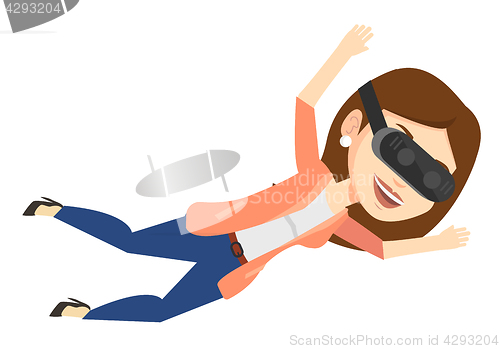 Image of Woman in vr headset flying in the sky.
