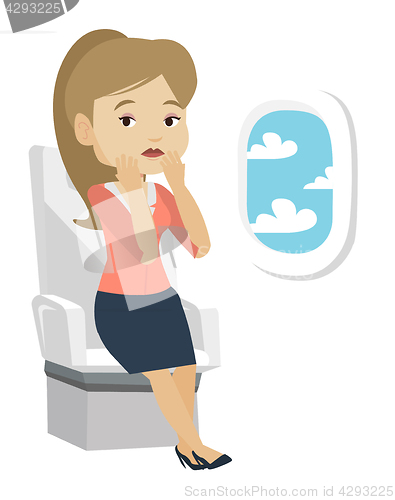 Image of Young woman suffering from fear of flying.