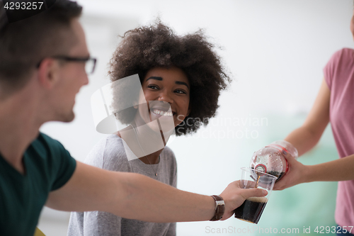 Image of multiethnic group of young people have a lunch break