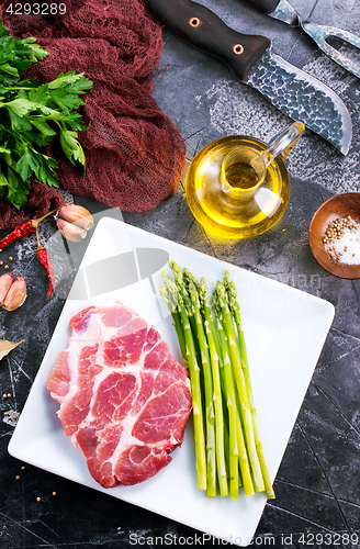 Image of meat with asparagus