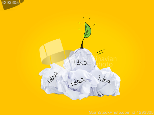 Image of Inspiration concept crumpled paper light bulb metaphor for good idea