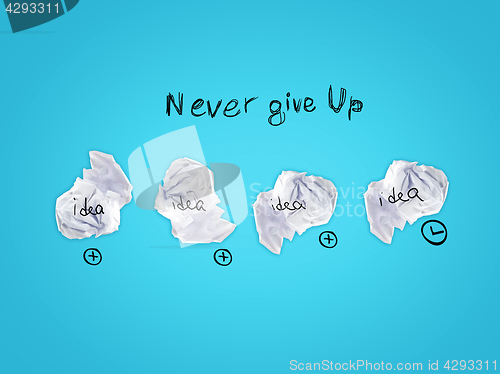 Image of Inspiration concept crumpled paper light bulb metaphor for good idea