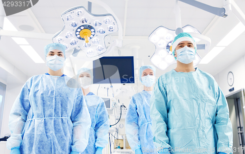 Image of group of surgeons in operating room at hospital