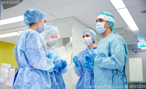 Image of group of surgeons in operating room at hospital