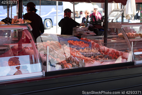 Image of BERGEN MARKET SQUARE, NORWAY - MAY 27, 2017: Grocery stores that