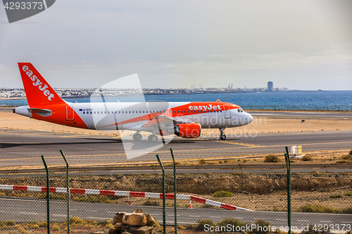 Image of ARECIFE, SPAIN - APRIL, 15 2017: AirBus A319-100 of easyjet read