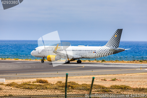 Image of ARECIFE, SPAIN - APRIL, 15 2017: AirBus A320 of vueling.com with