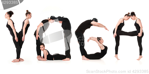 Image of The word YOGA formed by Gymnast bodies